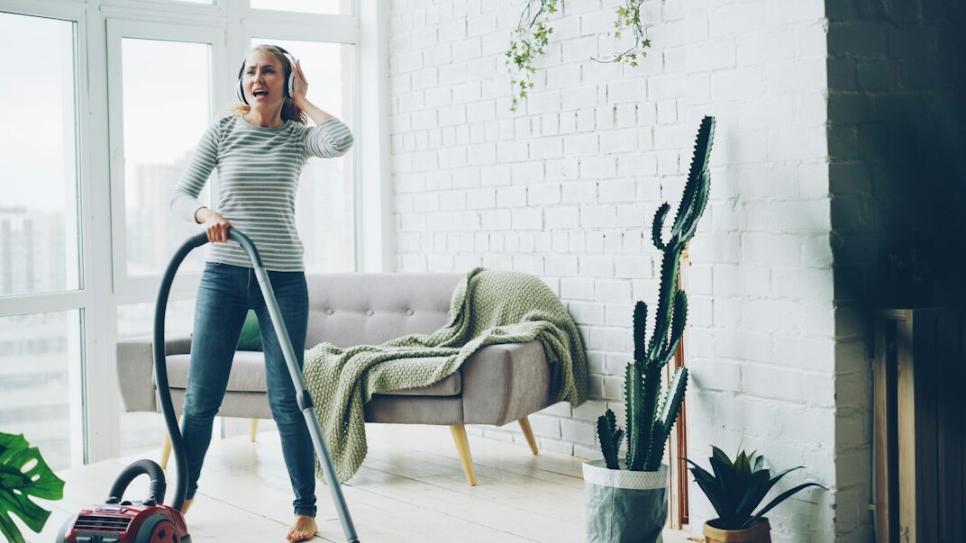 vacuuming rug at home